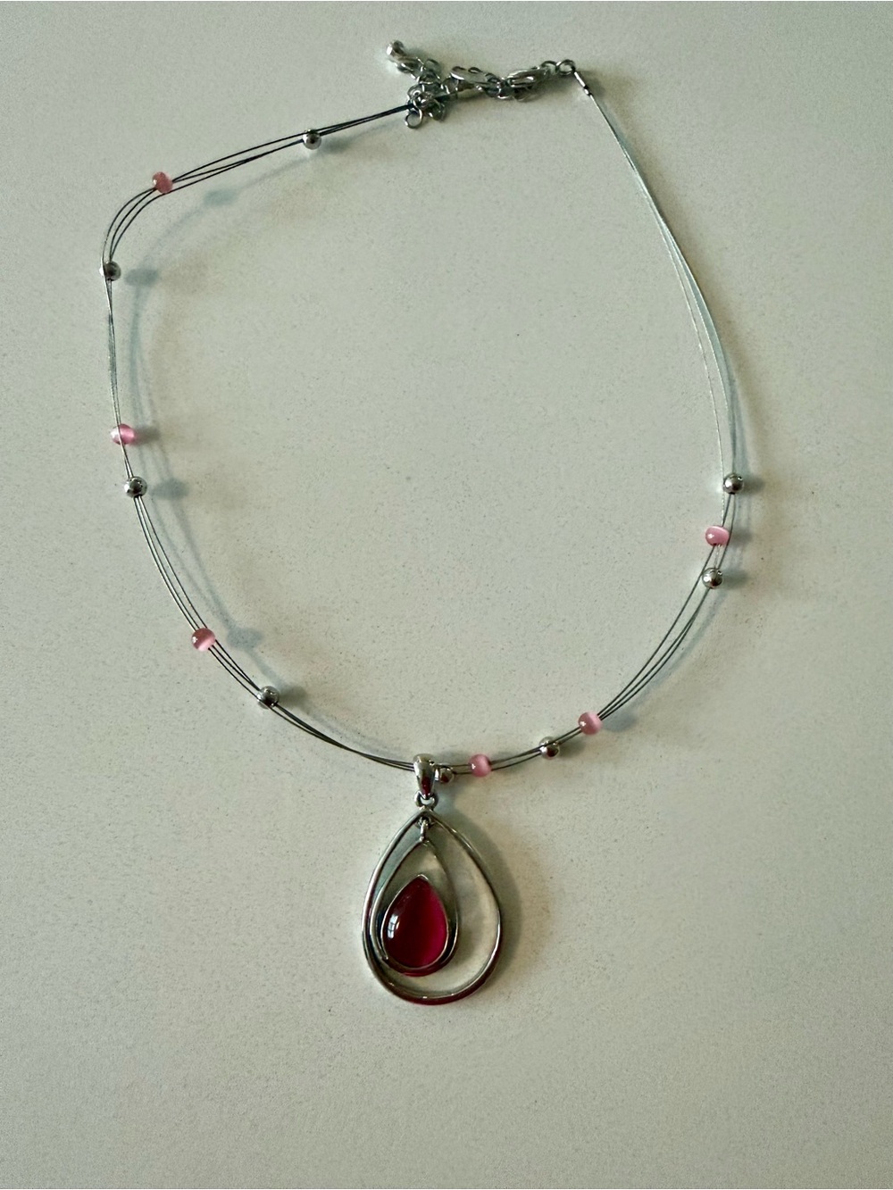 Lia Sophia Silver Teardrop Pendant Necklace with Pink Accent